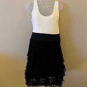 Express black dress with a lace ruffle bottom and a white stretch tee top Sz M